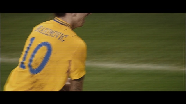 Video Reference: Player, Football player, Yellow, Team sport, Football, Sports equipment, T-shirt, Sport venue, Stadium, Ball game