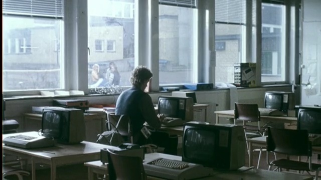 Video Reference: Office, Desk, Furniture, Job, Software engineering, Room, Building, Interior design, White-collar worker, Architecture