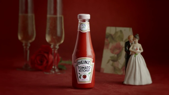Video Reference:  Bottle, Red, Glass bottle, Ketchup, Ingredient, Glasses, glass, Person