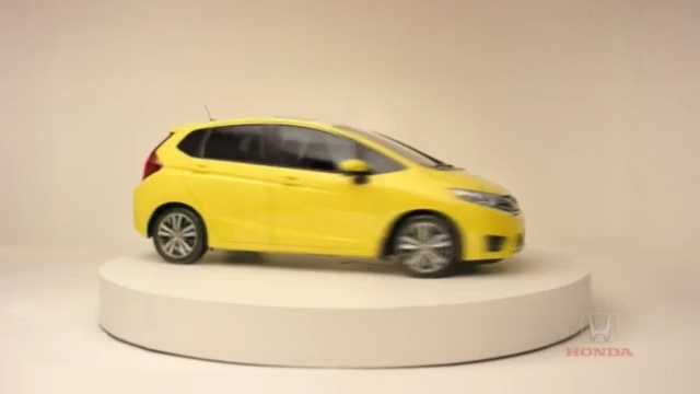 Video Reference: car, motor vehicle, vehicle, yellow, honda, automotive design, mode of transport, auto show, subcompact car, family car