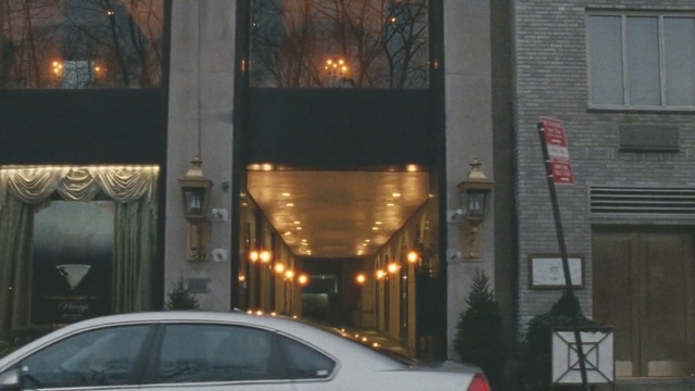 Video Reference: car, luxury vehicle, building, window, city, automotive exterior, night, vehicle, street, facade