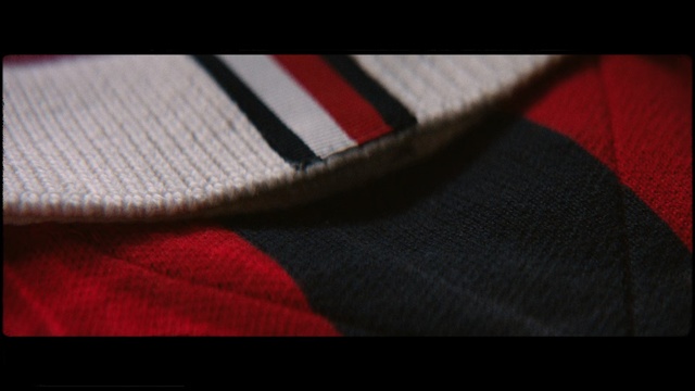 Video Reference: Jersey, Close-up, Carmine, Cap, Textile, Headgear, Pattern, Tartan, Sportswear, Hat