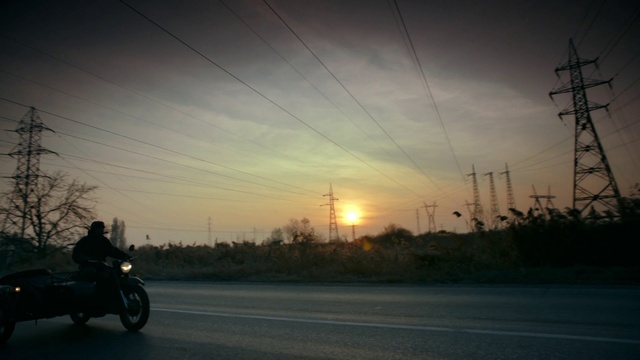 Video Reference: Sky, Cloud, Overhead power line, Morning, Sunset, Evening, Mode of transport, Afterglow, Road, Transport