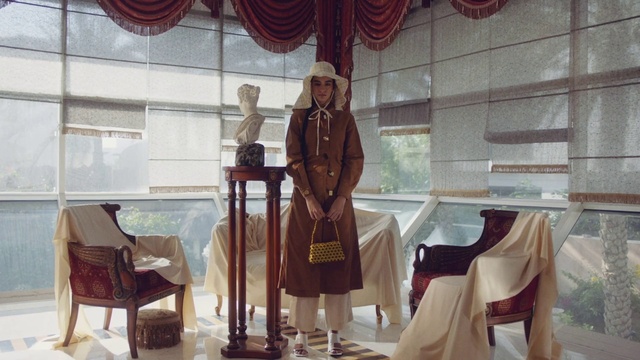 Video Reference: Fashion, Room, Interior design, Curtain, Textile, Window, Screenshot, Furniture