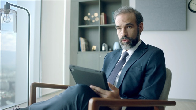 Video Reference: technology, electronic device, white collar worker, businessperson, suit, business, Person