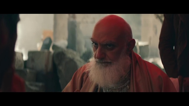 Video Reference: Beard, Moustache, Human, Facial hair, Mouth, Screenshot, Temple, Movie, Fictional character, Turban