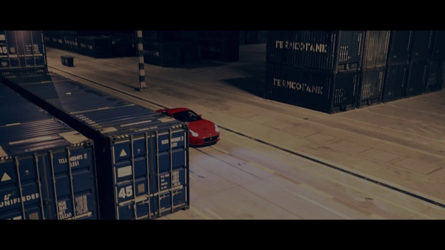 Video Reference: Mode of transport, Vehicle, Transport, Screenshot, Car, Race car, Pc game, Indoor, Sitting, Building, Table, Man, Room, Large, Riding, Luggage, Platform, Board, Red, Suitcase, Standing, Train, Ramp, White, City, Parked, Land vehicle, Floor, Text, Wheel, Video game