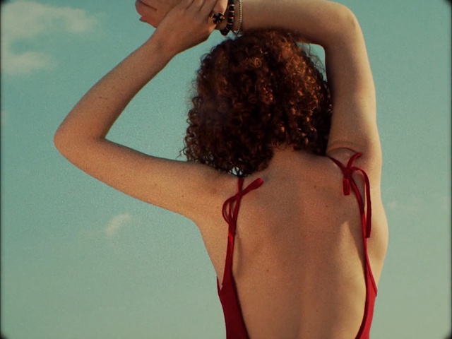 Video Reference: Hair, Shoulder, Back, Hairstyle, Long hair, Arm, Neck, Joint, Muscle, Black hair, Person, Woman, Clothing, Looking, Water, Wearing, Lady, Young, Female, Holding, Standing, Dress, Front, Racket, Head, Girl, White, Man, Black, Ball, Pink, Court, Player, Blue, Air, Swimming, Swimwear, Brassiere, Swimsuit