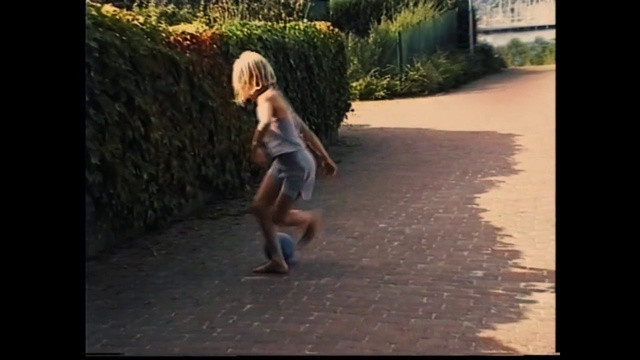 Video Reference: Plant, Leg, Flash photography, Shorts, People in nature, Road surface, Asphalt, Grass, Happy, Tints and shades