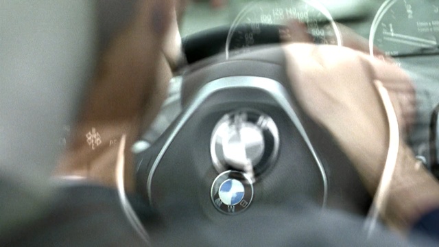 Video Reference: car, steering part, motor vehicle, vehicle, steering wheel, vehicle door, mode of transport, automotive design, bmw, personal luxury car