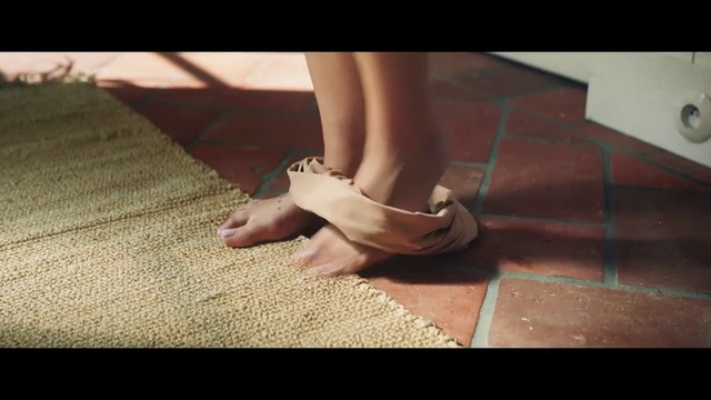 Video Reference: Leg, Footwear, Human leg, Foot, Shoe, Ankle, High heels, Toe, Brown, Sandal, Person, Sitting, Table, Front, Small, Young, Playing, Red, Woman, Laying, Computer, Game, Room, Holding, Standing, Remote, White, Rug, Video, Feet, Boot, Limb, Calf, Barefoot, Heel, Sock, Text, Knee, Sneakers, Legs, Walking shoe, Basic pump, Joint, Ballet flat, Flip-flops, Vein