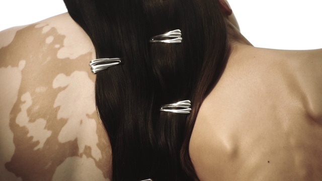 Video Reference: Shoulder, Eyelash, Neck, Sleeve, Waist, Black hair, Trunk, Chest, Close-up, Throat