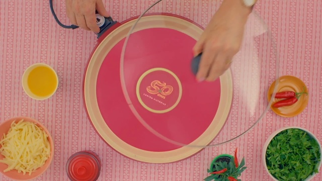 Video Reference: Pink, Circle, Placemat, Plate, Tableware, Platter, Person