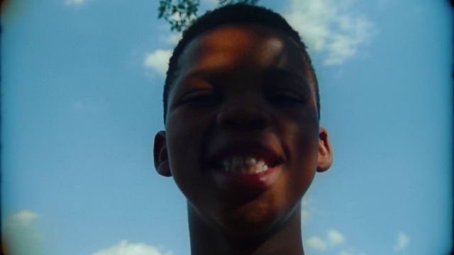 Video Reference: Face, Sky, Facial expression, Forehead, Head, Nose, Skin, Smile, Chin, Eyebrow