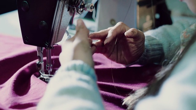 Video Reference: purple, hand, finger, nail, arm, leg, sewing, textile, girl, sewing machine
