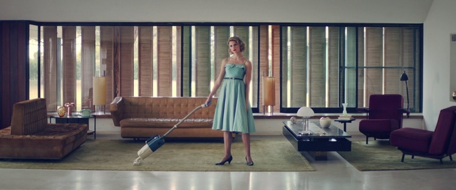 Video Reference: Room, Dress, Floor, Fashion, Shoulder, Flooring, Interior design, Window covering, Window, Furniture