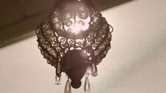 Video Reference: Lighting, Light fixture, Lighting accessory, Lampshade, Facial hair, Metal, Person