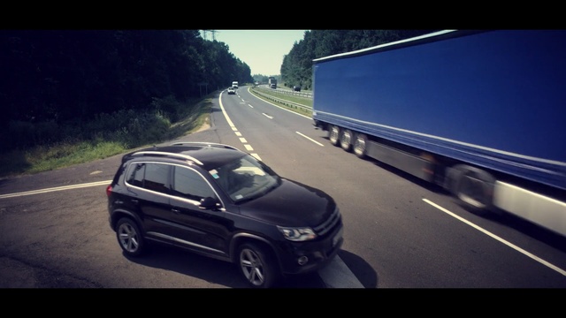 Video Reference: Land vehicle, Vehicle, Car, Volkswagen, Automotive design, Sky, Road, Sport utility vehicle, Volkswagen tiguan, Infrastructure