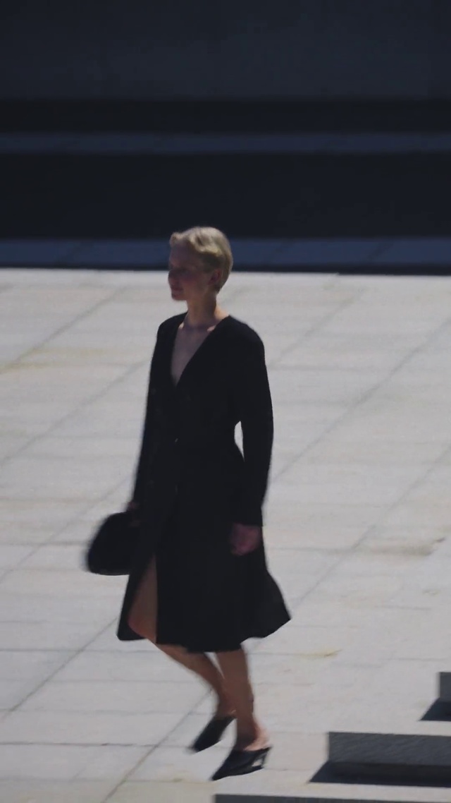 Video Reference: Standing, Snapshot, Fashion, Footwear, Outerwear, Suit, Formal wear, Human, Leg, Blazer