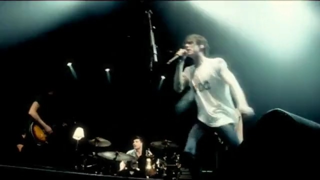 Video Reference: performance, rock concert, singer, singing, stage, music artist, concert, bassist, musician, entertainment, Person