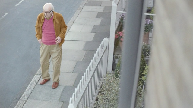 Video Reference: fence, picket fence, barrier, railing, Person