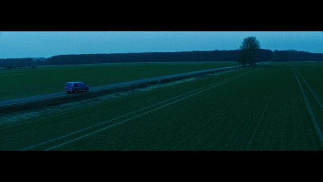 Video Reference: Green, Grassland, Field, Mode of transport, Plain, Natural environment, Grass, Line, Horizon, Rural area