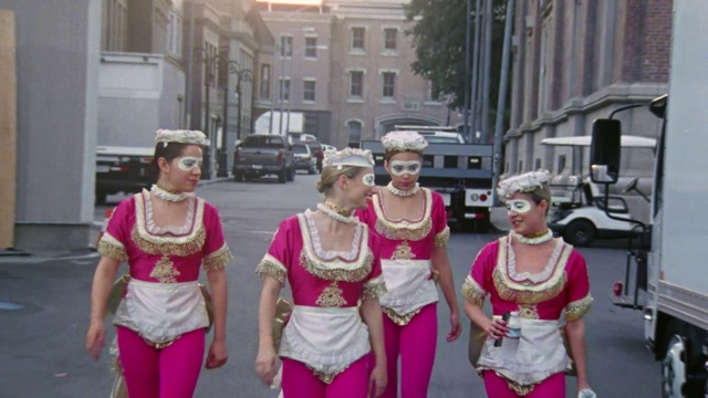 Video Reference: Pink, Snapshot, Magenta, Fun, Street, Tourism, Travel, Pedestrian, Event, Vacation, Person