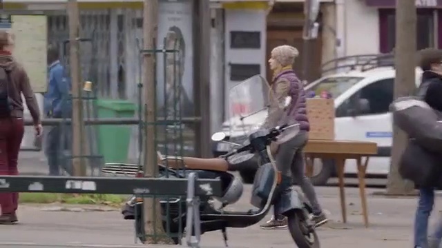 Video Reference: Mode of transport, Vehicle, Scooter, Sitting, Personal protective equipment, Helmet, Vespa, Motorcycle, Moped, Street