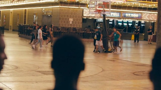 Video Reference: sport venue, flooring, fun, recreation, floor, sports, crowd, indoor games and sports, Person