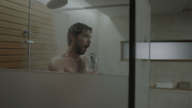 Video Reference: Bathing, Room, Shower, Barechested, Bathroom, Muscle, Glass, Plumbing fixture, Bathtub, Transparent material, Person