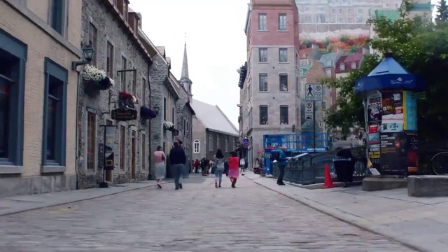 Video Reference: Town, Neighbourhood, Street, Pedestrian, Downtown, Human settlement, City, Road, Building, Thoroughfare