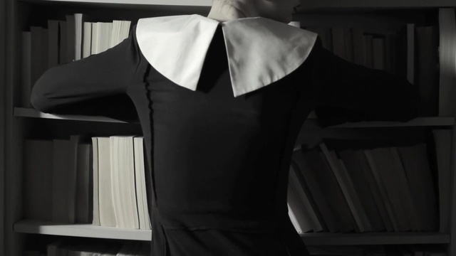 Video Reference: black, shoulder, black and white, formal wear, outerwear, gentleman, suit, tuxedo, sleeve, neck