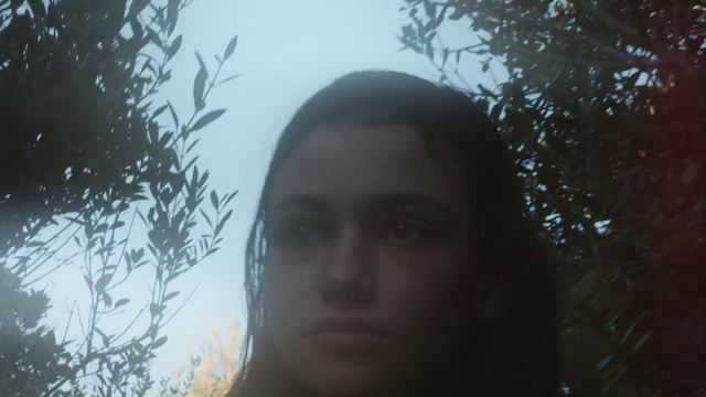 Video Reference: Face, Hair, Photograph, Facial expression, Nose, Head, Forehead, Eyebrow, Portrait, Atmospheric phenomenon, Person