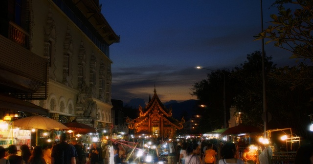 Video Reference: sky, night, city, town, landmark, evening, tourist attraction, urban area, tree, lighting, Person