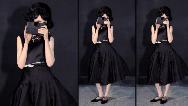 Video Reference: Black, Clothing, Fashion model, Dress, Fashion, Little black dress, Cocktail dress, Neck, Formal wear, Photography, Person
