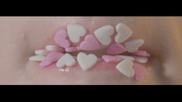 Video Reference: Pink, Tooth, Sweetness, Petal, Heart, Fondant, Mouth, Love, Smile, Marshmallow, Person