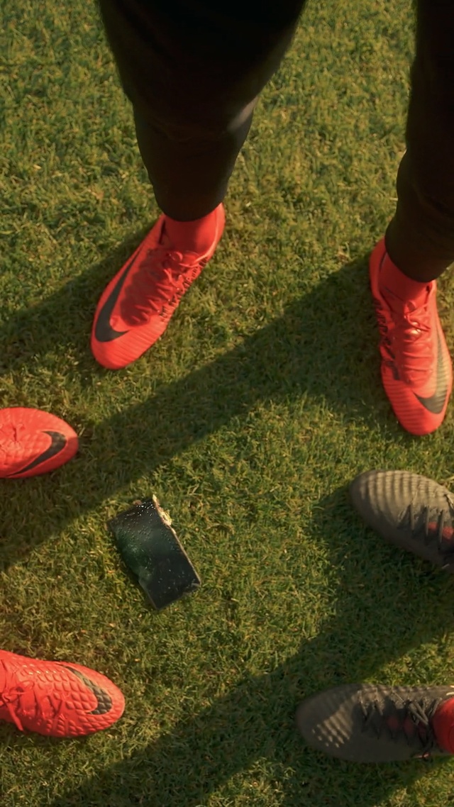 Video Reference: red, green, footwear, grass, lawn, plant, shoe, outdoor shoe, foot, play