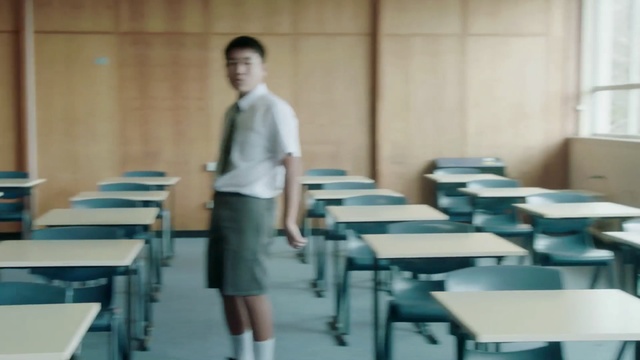 Video Reference: room, classroom, furniture, education, table, class, job, teacher, student, Person