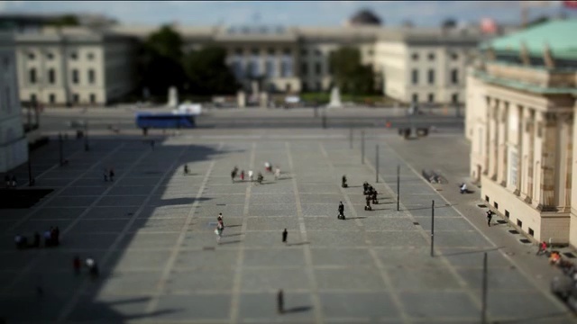 Video Reference: plaza, town square, city, sky, roof, building, facade, Person