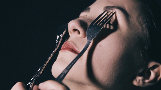 Video Reference: microphone, eyebrow, chin, hand, lip, girl, human body, black hair, singing, finger, Person