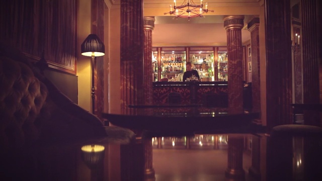 Video Reference: Lighting, Room, Bar, Sky, Building, Interior design, Restaurant, Night, Light fixture, Furniture