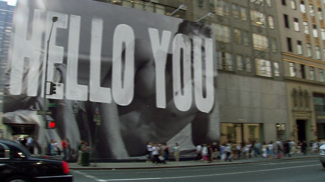 Video Reference: Building, Window, Art, Font, Urban design, Facade, City, Road, Pedestrian, Advertising