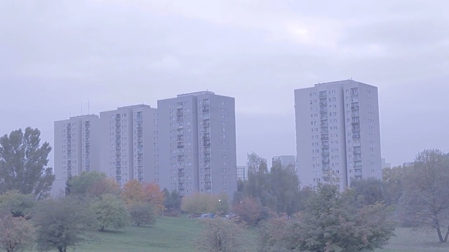 Video Reference: Tower block, Metropolitan area, Atmospheric phenomenon, Skyscraper, Daytime, Urban area, Human settlement, City, Architecture, Haze