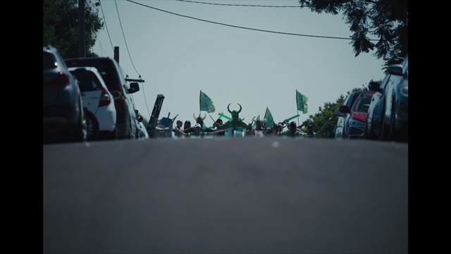 Video Reference: Snapshot, Mode of transport, Crowd, Photography, Bicycle motocross, Street, Road, Vehicle, Asphalt, Style