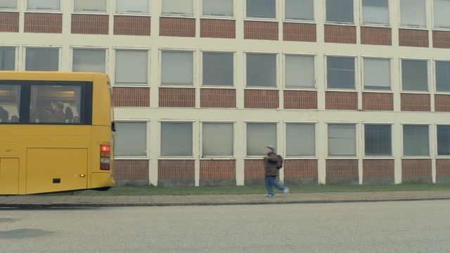 Video Reference: Transport, Mode of transport, Motor vehicle, Bus, Vehicle, Yellow, School bus, Line, Car, Architecture, Person