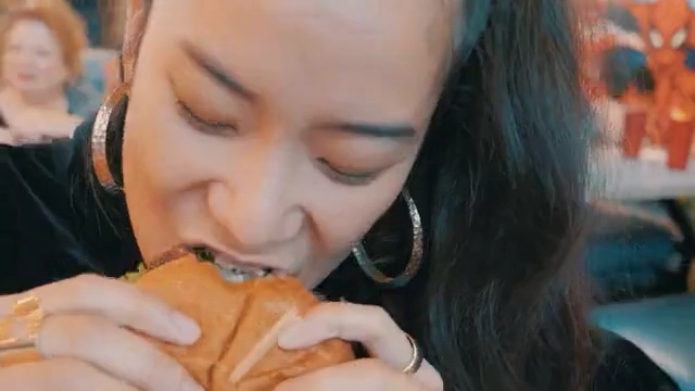 Video Reference: human hair color, blond, girl, mouth, finger, black hair, cheek, eating, lip, hand, Person