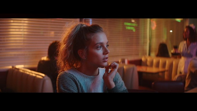 Video Reference: Photograph, Face, Snapshot, Nose, Fun, Mouth, Photography, Sitting, Brown hair, Long hair, Person, Indoor, Woman, Cellphone, Phone, Table, Girl, Holding, Young, Looking, Food, Front, Fire, Man, Talking, Room, Standing, Smiling, Television, Restaurant, Red, Eating, Pizza, People, Human face