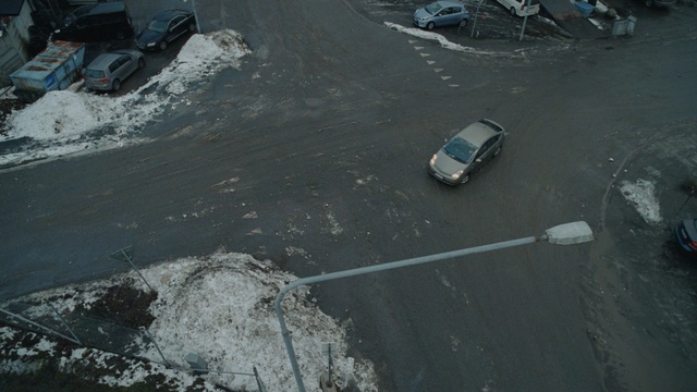 Video Reference: Geological phenomenon, Vehicle, Asphalt, Car, Road, Soil, Parking, Subcompact car, Road surface