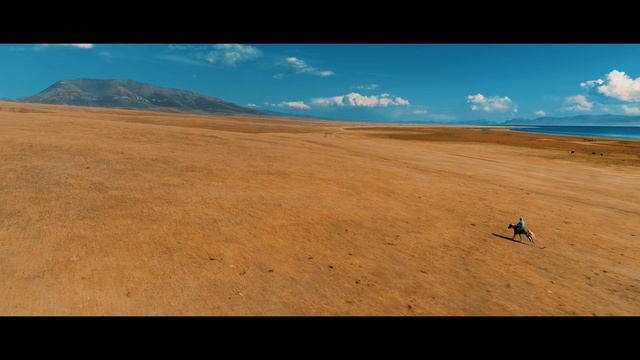 Video Reference: sky, ecosystem, horizon, cloud, plain, steppe, ecoregion, hill, grassland, sand