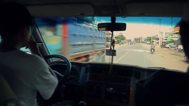 Video Reference: car, motor vehicle, mode of transport, vehicle, driving, transport, glass, windshield, public transport, family car, Person